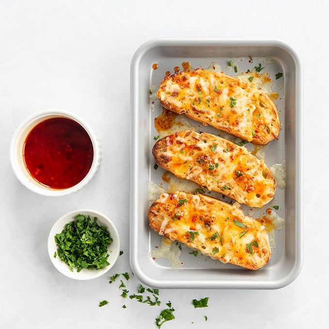 Nordic Ware Brilliant™ Colorful 3-Pc Baking Set, Nonstick made without PFAS or PTFE for safe cooking; Reinforced steel rim prevents warping; Includes Half Sheet, Quarter Sheet, and Eighth Sheet